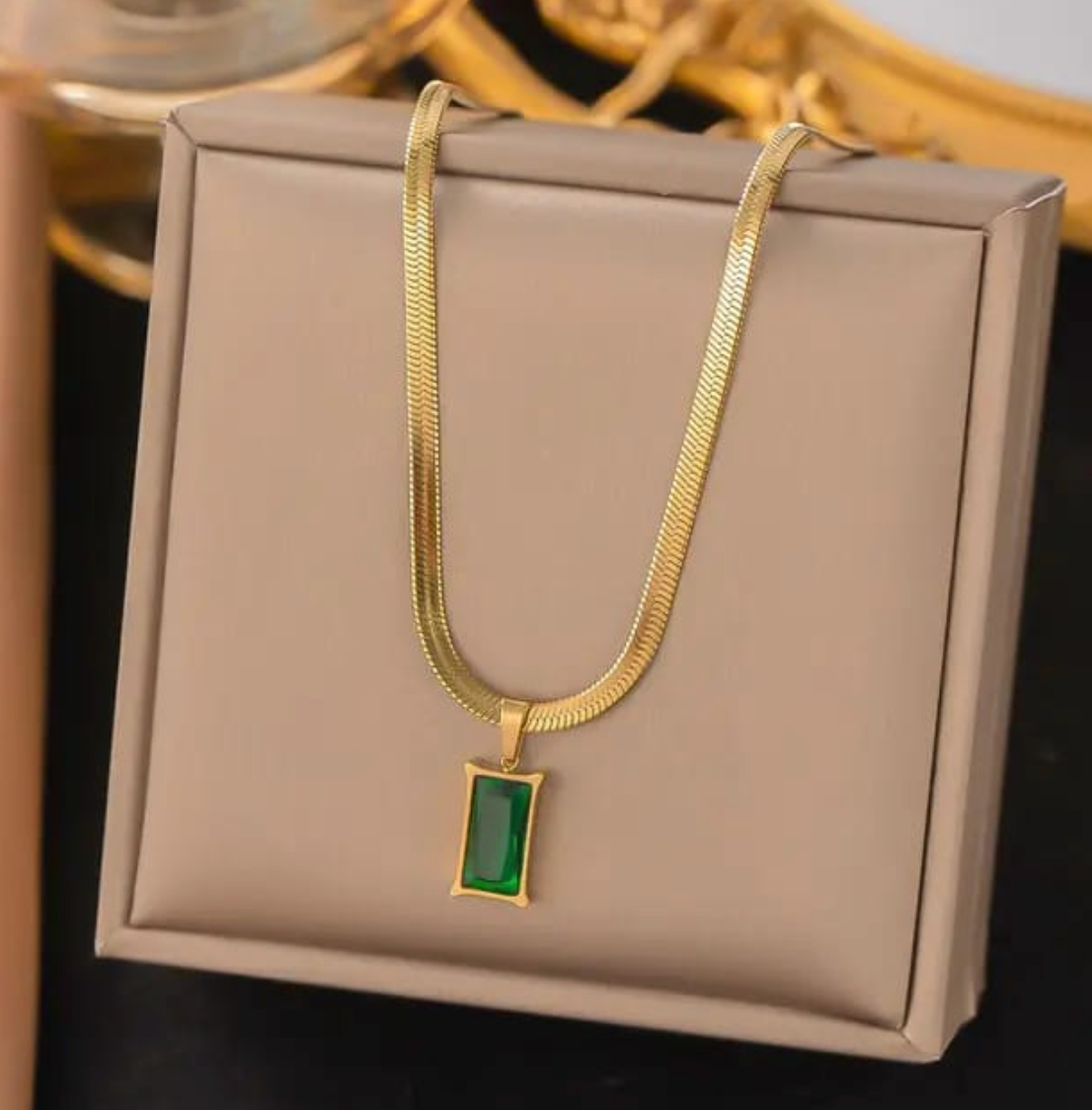 SOJI - Korean Style Snake Bone Necklace – Emerald Green Pendant